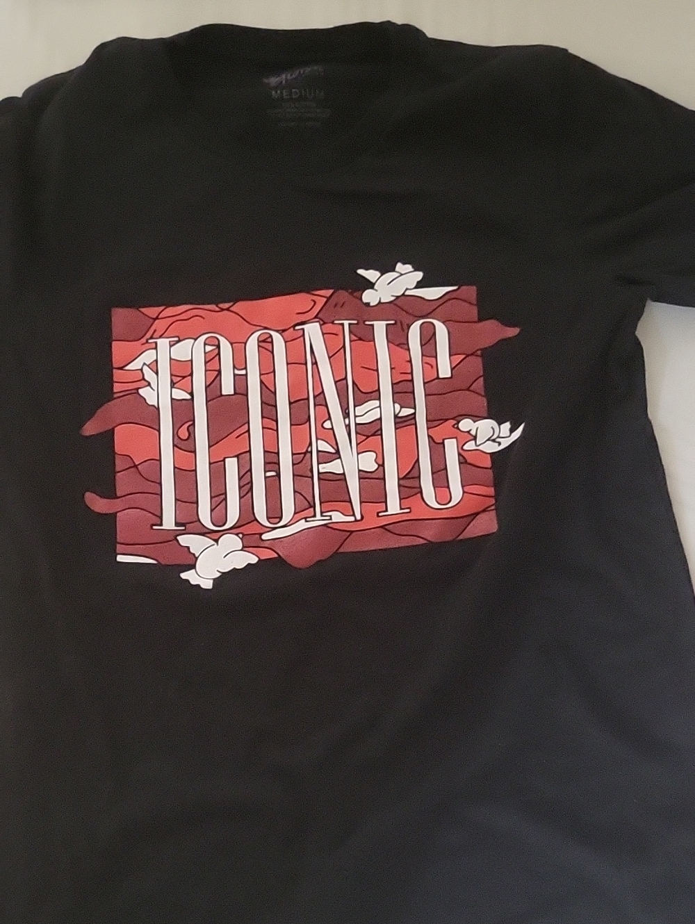 Black Graphic Tee with 'ICONIC' Red Panel